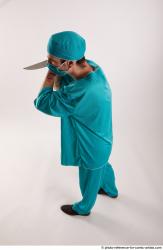 FALCO DOCTOR STANDING POSE WITH KNIFE